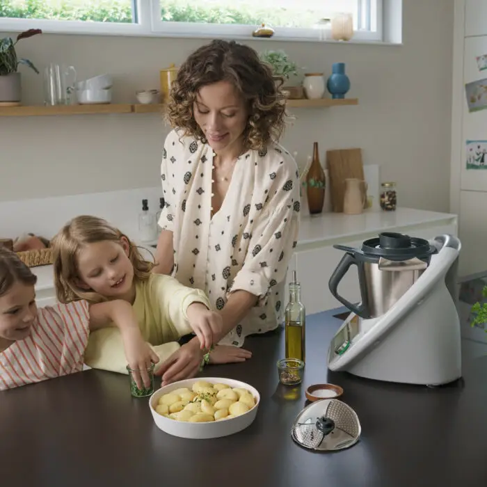 Children and mother cooking with Thermomix