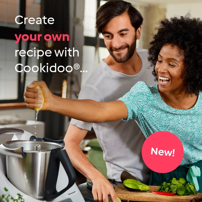 Man and a woman cooking together with Thermomix